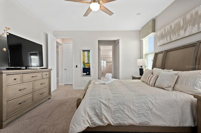 bedroom with ceiling fan and light colored carpet