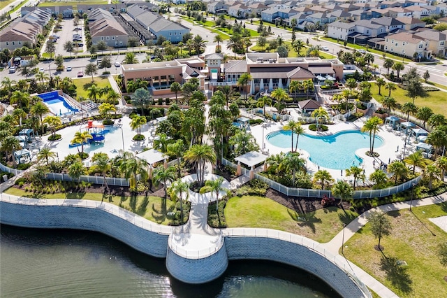 birds eye view of property featuring a water view