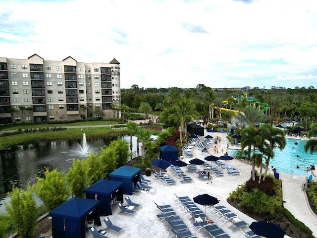 birds eye view of property featuring a water view