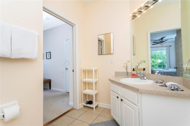 bathroom featuring tile flooring, large vanity, and ceiling fan