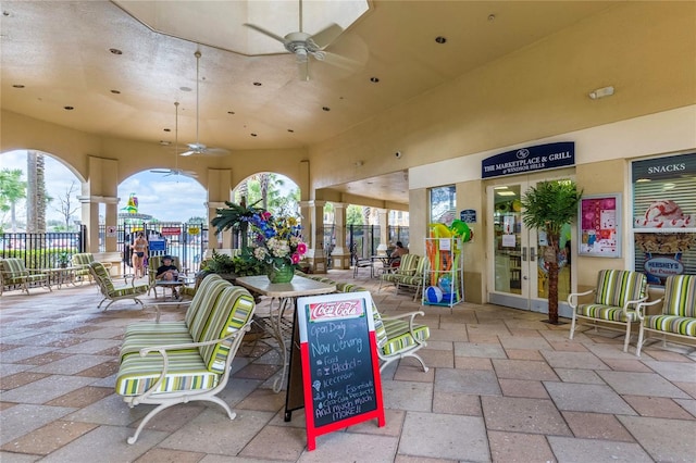 view of terrace with french doors and ceiling fan