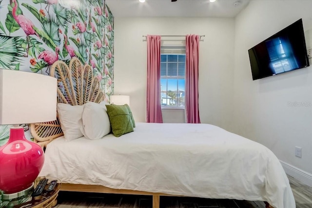 bedroom featuring dark hardwood / wood-style floors