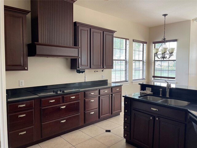 kitchen featuring an inviting chandelier, sink, light tile floors, and custom exhaust hood