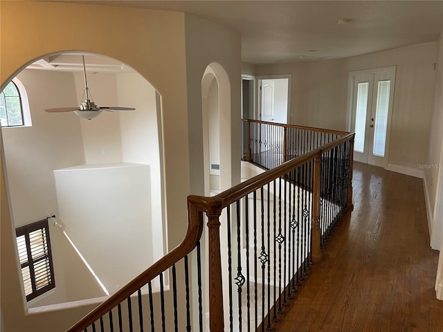 corridor with dark hardwood / wood-style floors