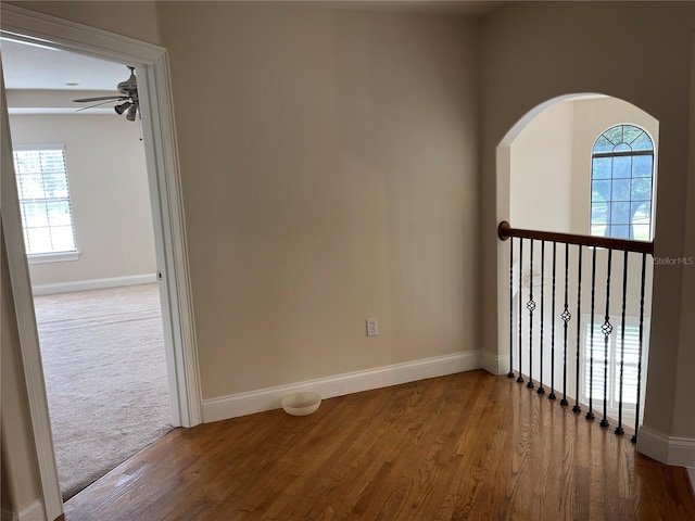 spare room with ceiling fan and light hardwood / wood-style floors