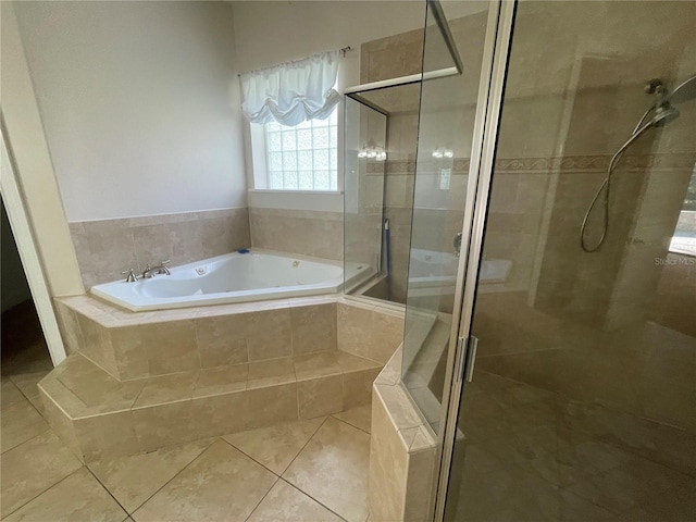 bathroom featuring tile flooring and plus walk in shower