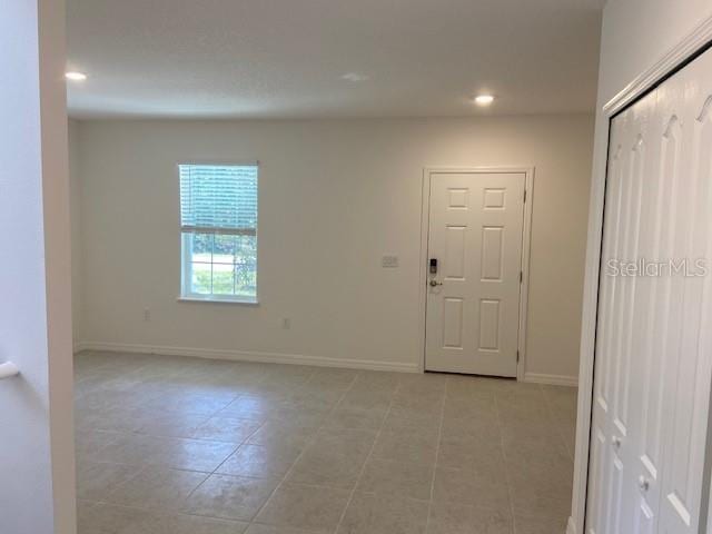 view of tiled foyer entrance