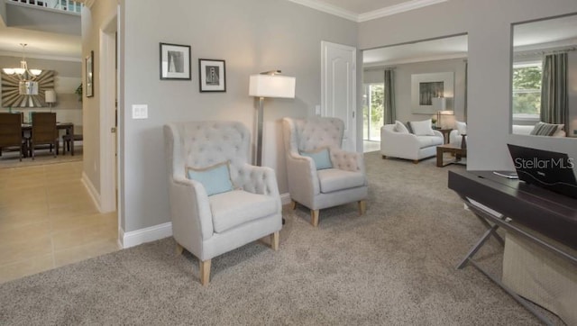 living area featuring crown molding, light carpet, and an inviting chandelier