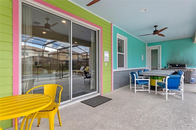 view of terrace featuring grilling area and ceiling fan