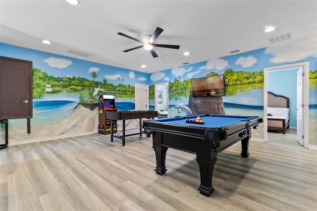 game room featuring billiards, ceiling fan, and light wood-type flooring