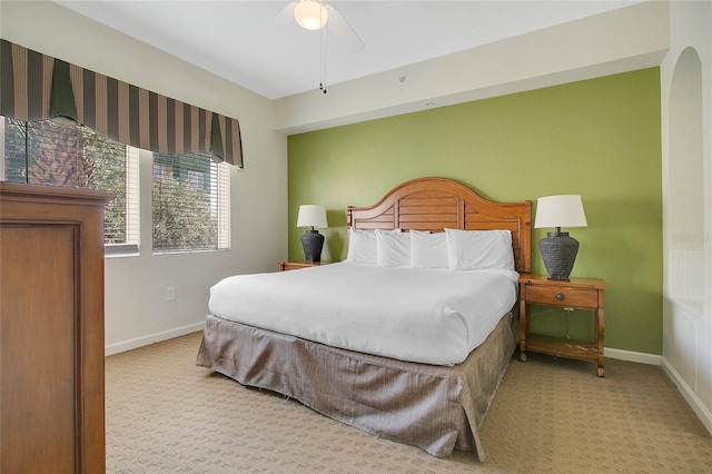 8100 Poinciana Blvd Unit 2212, Orlando, FL 32821 - carpeted bedroom with baseboards and ceiling fan