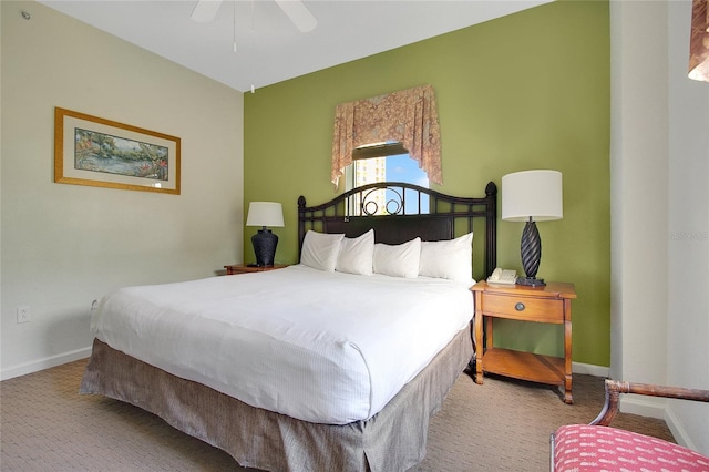 8100 Poinciana Blvd Unit 2212, Orlando, FL 32821 - carpeted bedroom featuring baseboards and a ceiling fan