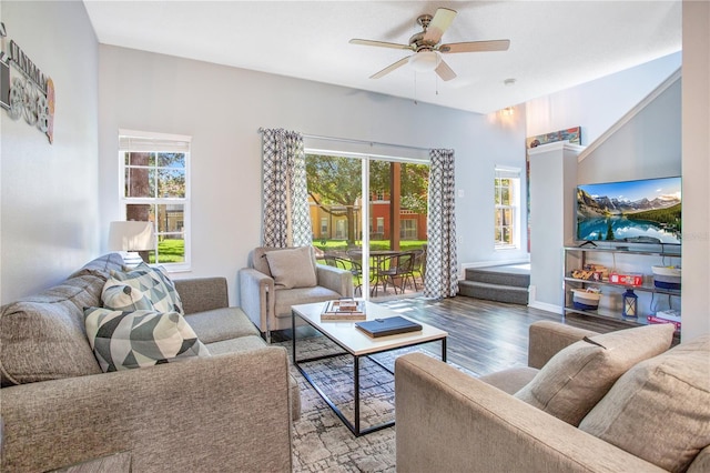 living room featuring a healthy amount of sunlight, ceiling fan, and light hardwood / wood-style flooring