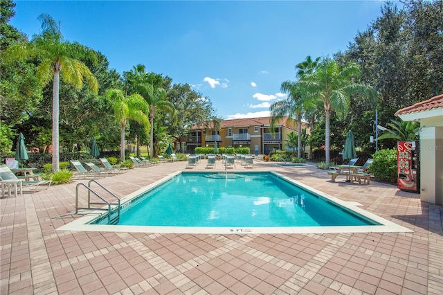 view of pool featuring a patio