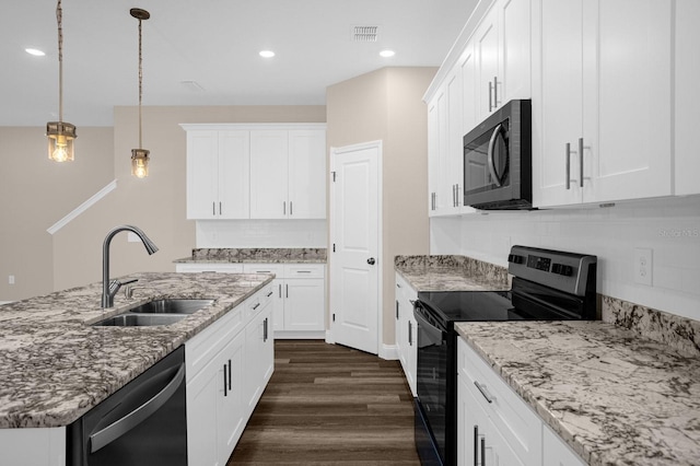 kitchen featuring white cabinetry, dark hardwood / wood-style floors, and stainless steel appliances