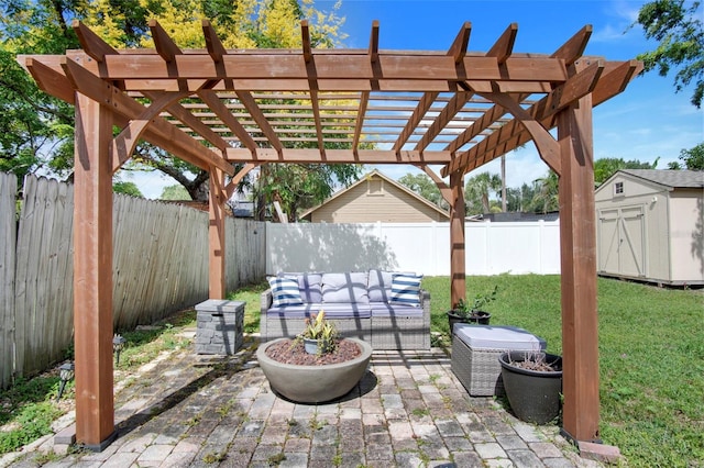 view of terrace with outdoor lounge area, a pergola, and a shed