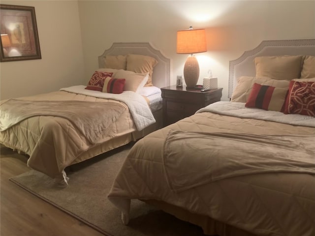 bedroom featuring hardwood / wood-style floors