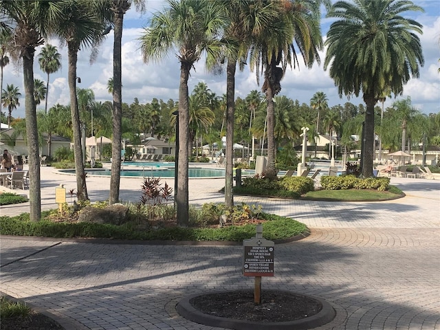 view of property's community featuring a pool