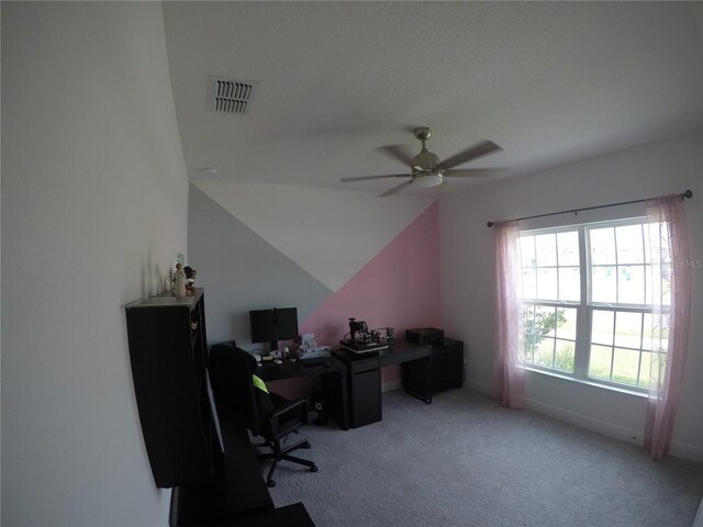 office with light carpet, vaulted ceiling, a textured ceiling, and ceiling fan