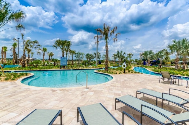 view of pool featuring a patio area