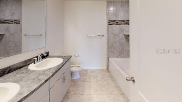 full bathroom with tile patterned floors, vanity, toilet, and tiled shower / bath