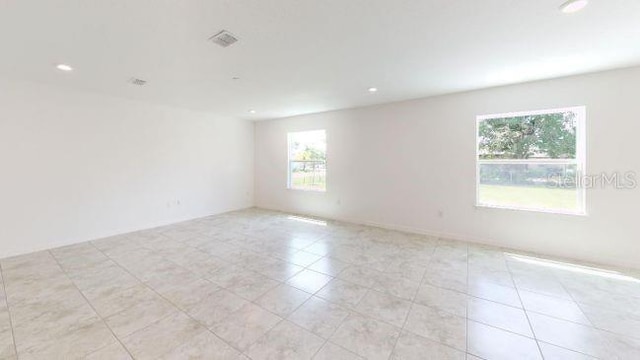 view of tiled spare room