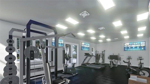 exercise room featuring visible vents and baseboards