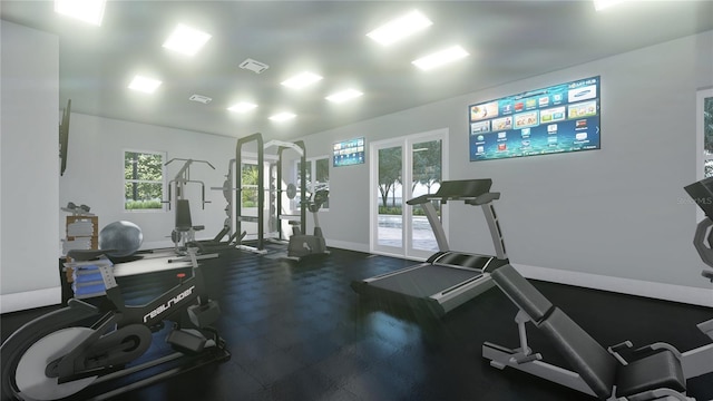 exercise room featuring visible vents and baseboards