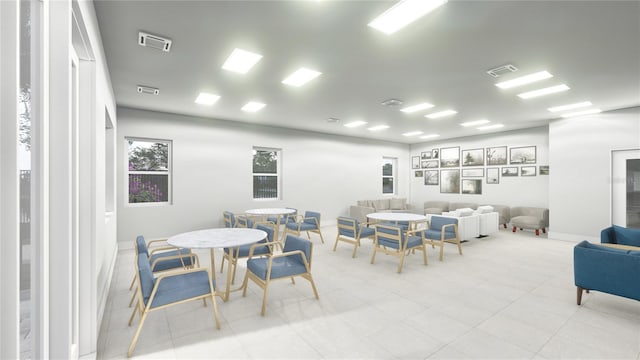 dining area featuring baseboards and visible vents