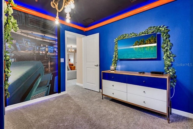 bedroom featuring light colored carpet