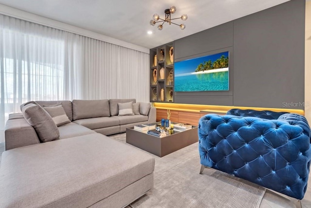 living room with a notable chandelier