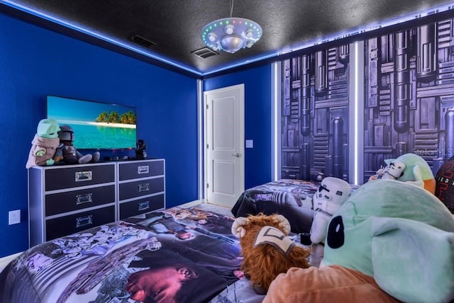 bedroom with a textured ceiling