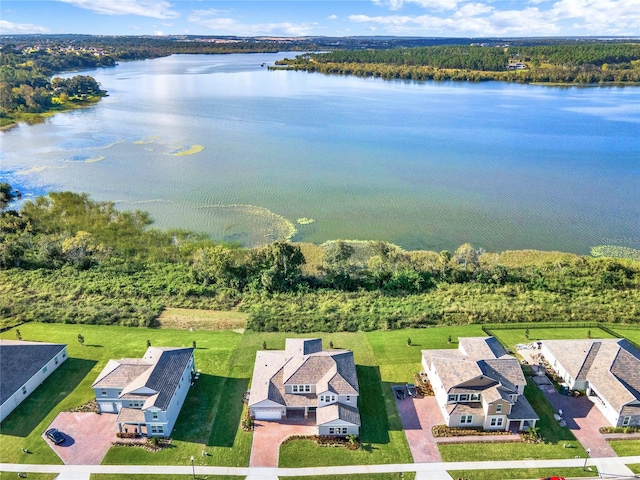 drone / aerial view with a water view