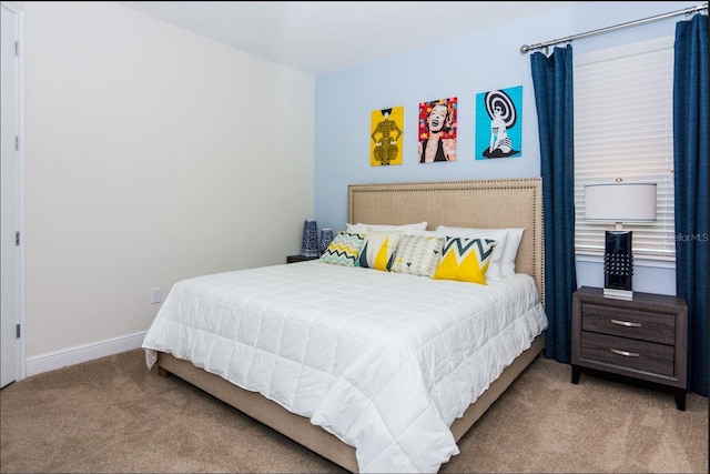 bedroom with light carpet