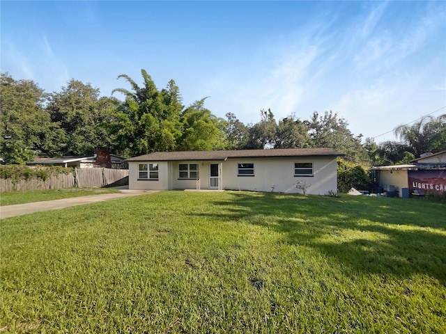 ranch-style house with a front yard