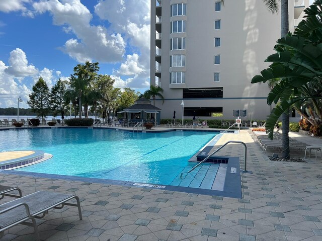 view of pool with a gazebo and a patio