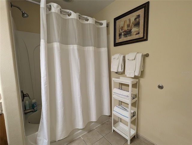 bathroom featuring tile patterned floors and shower / bath combination with curtain