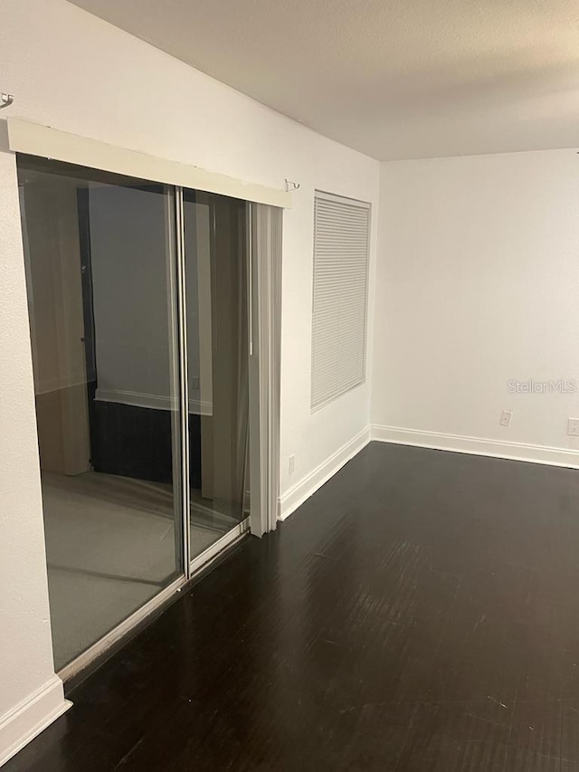 interior space featuring dark wood-type flooring