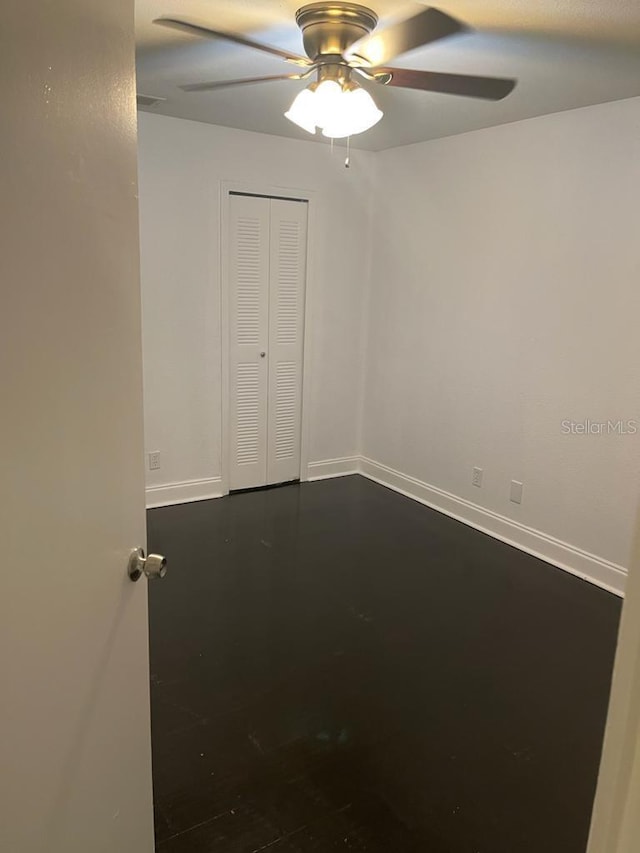 spare room featuring ceiling fan