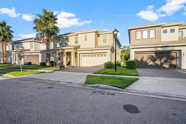 view of front of property with a garage