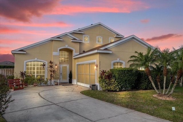 view of front of property with a yard