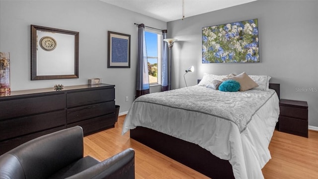 bedroom featuring light wood-type flooring