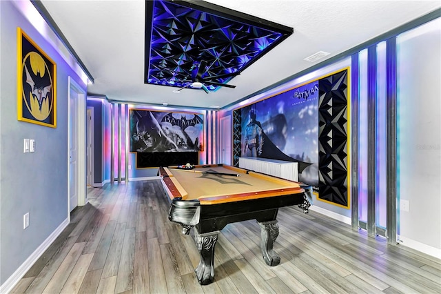 rec room with pool table and light hardwood / wood-style flooring