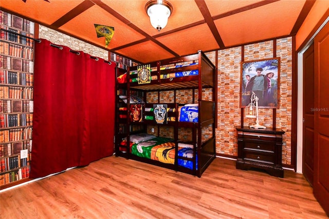 interior space with hardwood / wood-style floors and a textured ceiling