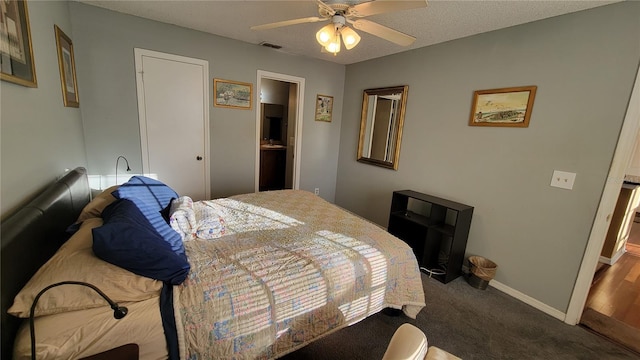 carpeted bedroom featuring connected bathroom and ceiling fan