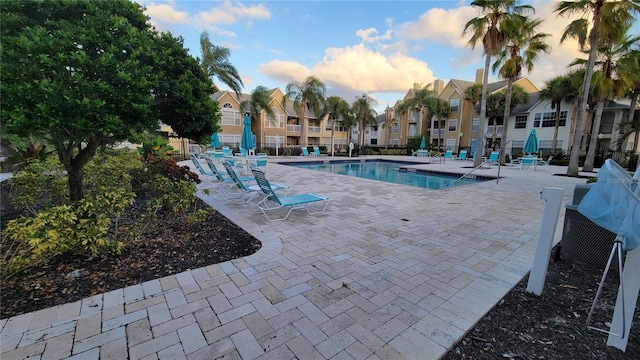 view of swimming pool featuring a patio