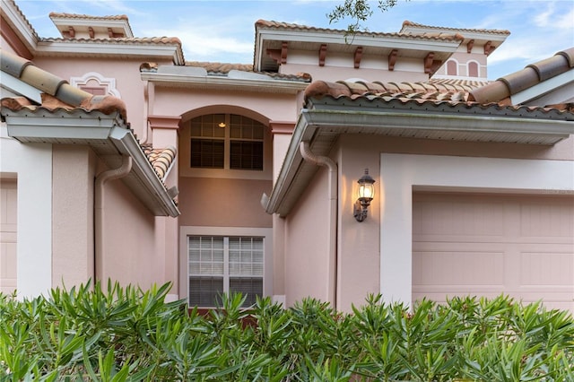 property entrance featuring a garage