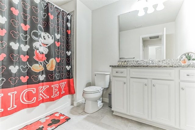 full bathroom with vanity, tile patterned flooring, shower / bathtub combination with curtain, and toilet