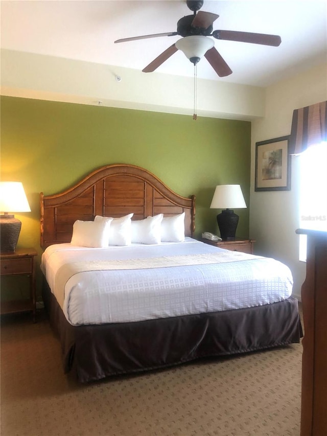 bedroom with carpet floors and ceiling fan