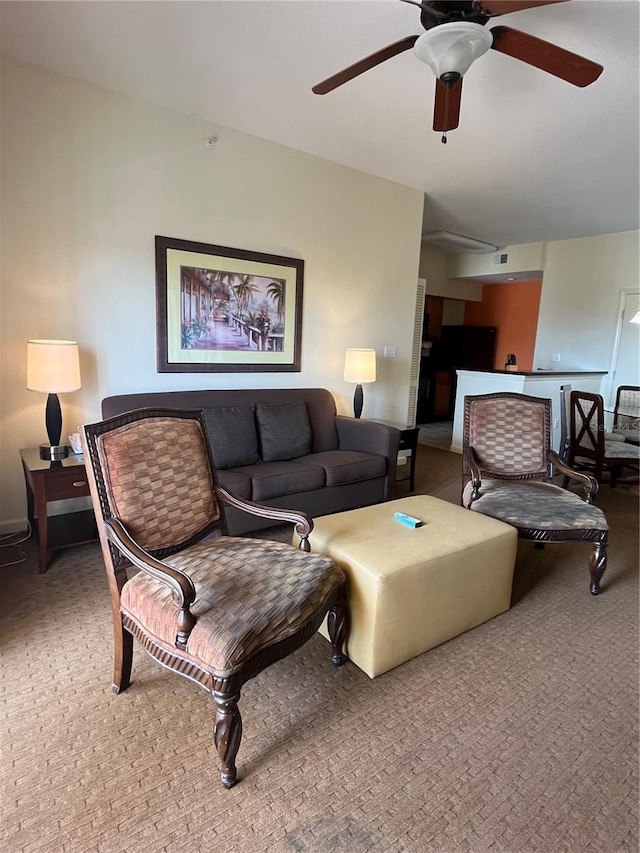 8112 Poinciana Blvd Unit 1605, Orlando, FL 32821 - carpeted living room with a ceiling fan